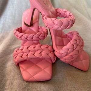 Pink puffy heeled slides